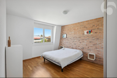 Attique avec vue splendide sur le lac et les Alpes